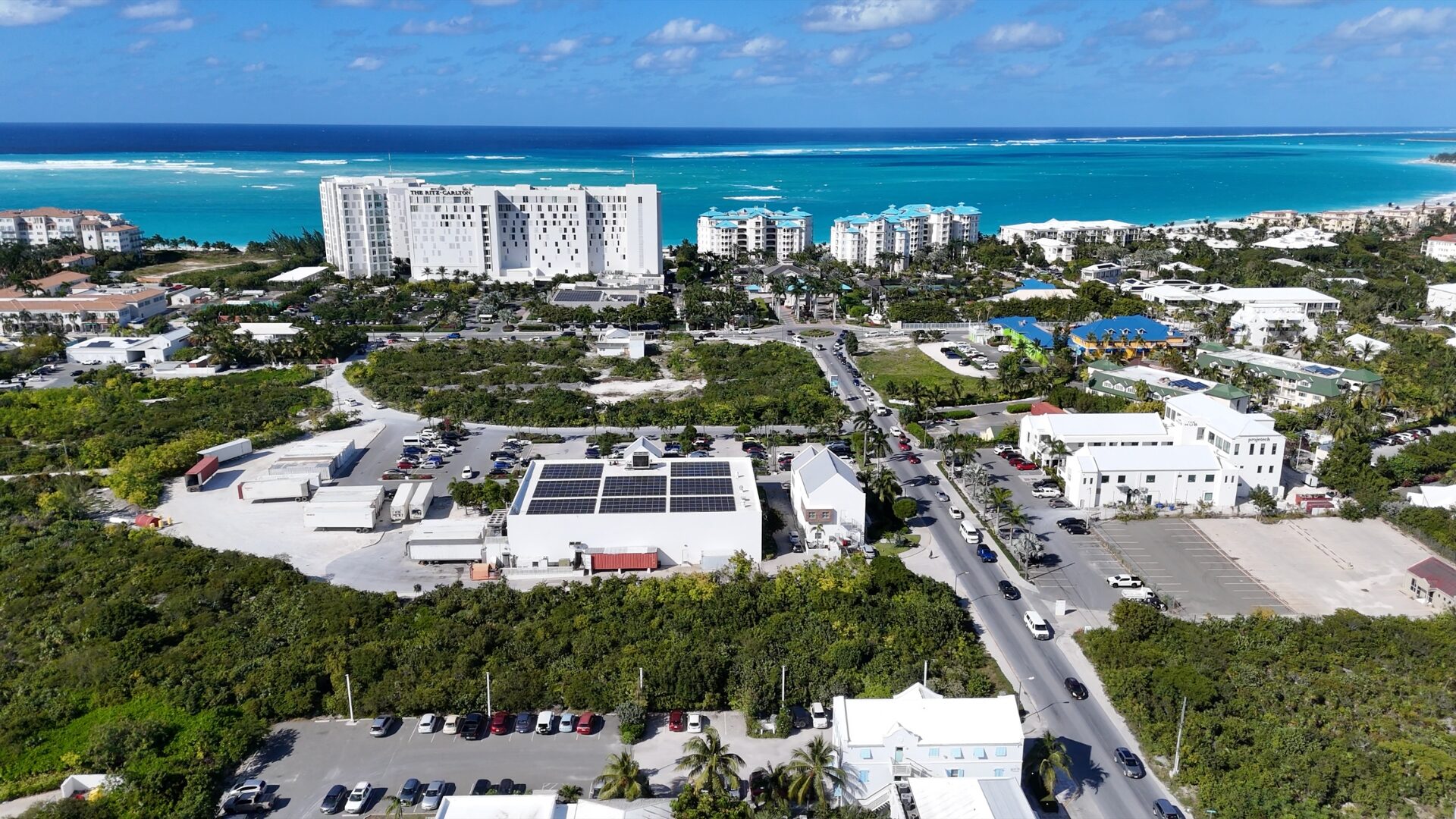 Looking north over the site to the turquoise water of Grace Bay
